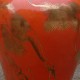Lovely coral colored temple jar with gilt crane motif
